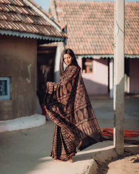 Jharokha -Black silk cotton Ajrakh handblockprinted saree