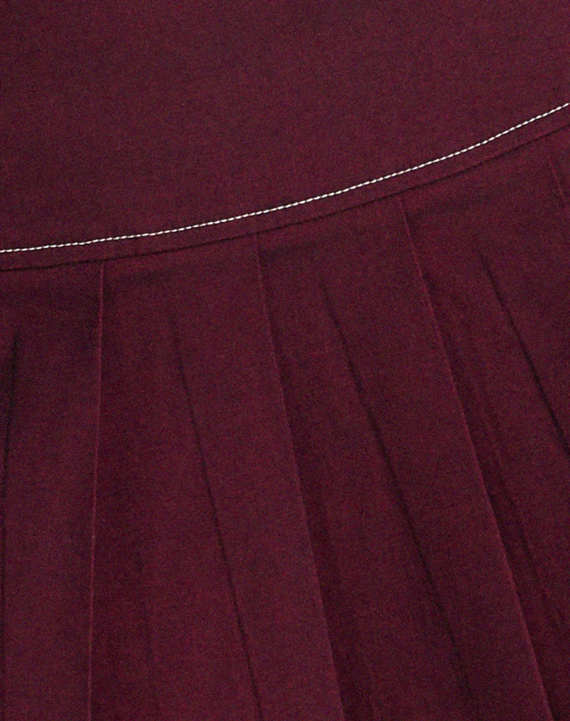 Zabini Low Rise Pleated Mini Skirt in Burgundy with Ecru Stitch Detail